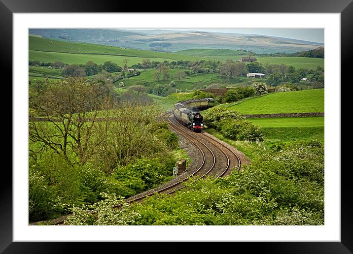 Steam train in the landscape. Framed Mounted Print by David Birchall