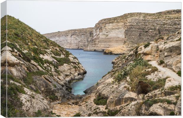 Xlendi Bay surrounded by cliffs Canvas Print by Jason Wells
