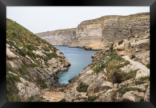 Xlendi Bay surrounded by cliffs Framed Print by Jason Wells