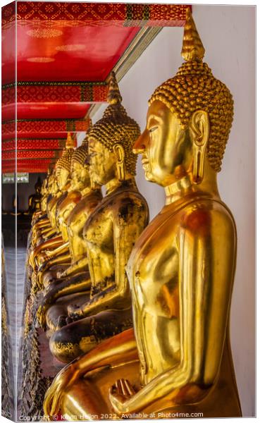Buddha statues in Wat Pho, Bangkok, Thailand Canvas Print by Kevin Hellon