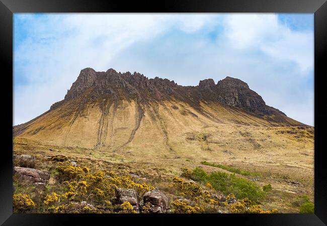 The serrated ridge of Stac Pollaidh Framed Print by Keith Douglas
