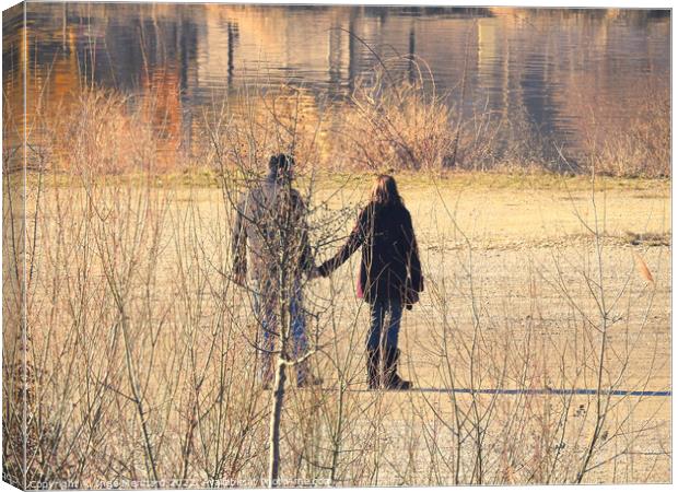 Scenic shot of a couple walking around the lake Canvas Print by Ingo Menhard