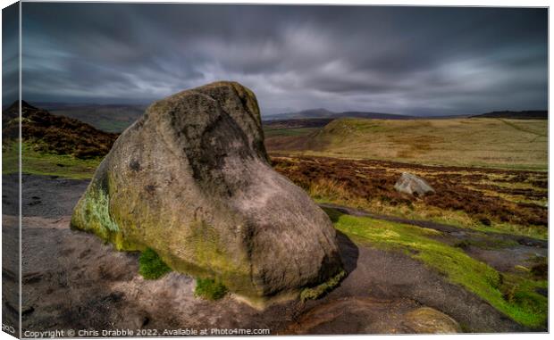 Higger Tor under storm clouds Canvas Print by Chris Drabble