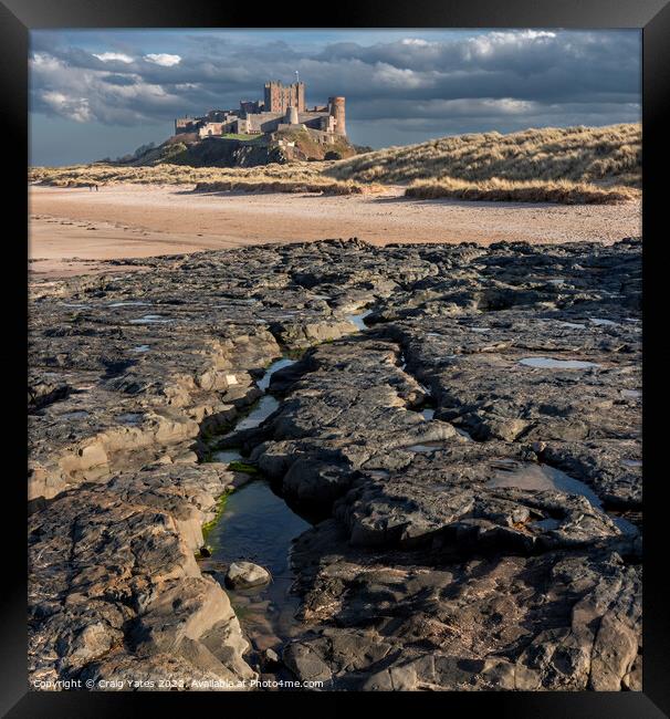 Bamburgh Beach and Castle Framed Print by Craig Yates