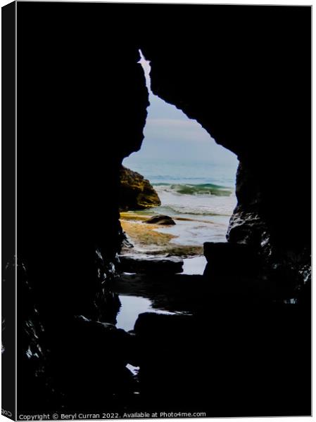 Secluded Beach Cave Canvas Print by Beryl Curran