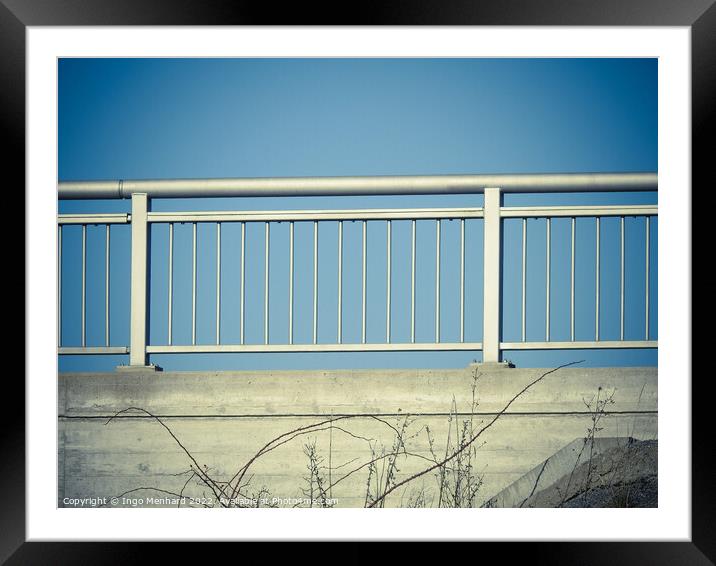 Closeup shot of iron porch railings on a blue sky background Framed Mounted Print by Ingo Menhard