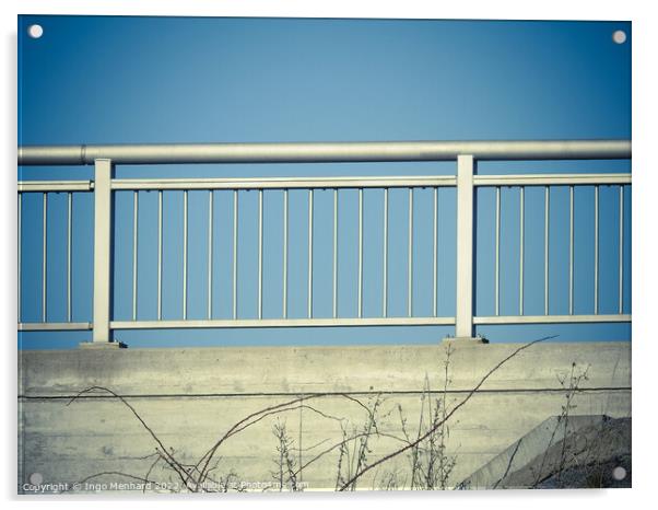 Closeup shot of iron porch railings on a blue sky background Acrylic by Ingo Menhard