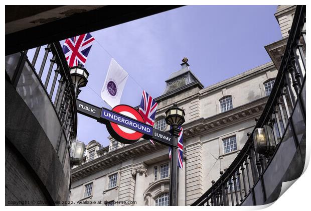 Bunting above the tube station Print by Clive Wells