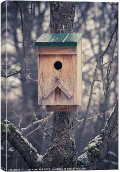 Outdoor bird house in winter Canvas Print by Ingo Menhard