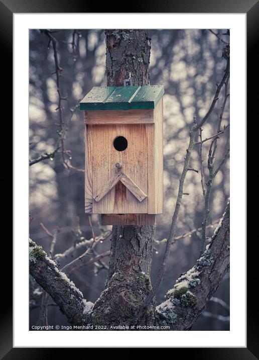 Outdoor bird house in winter Framed Mounted Print by Ingo Menhard