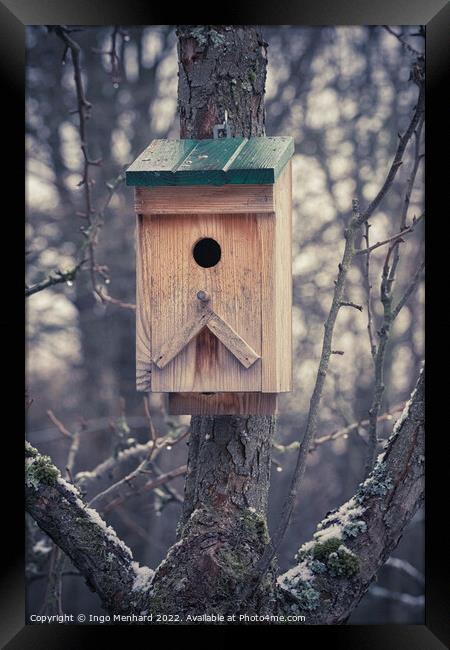 Outdoor bird house in winter Framed Print by Ingo Menhard