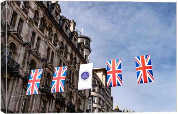 Banners and flags Canvas Print by Clive Wells