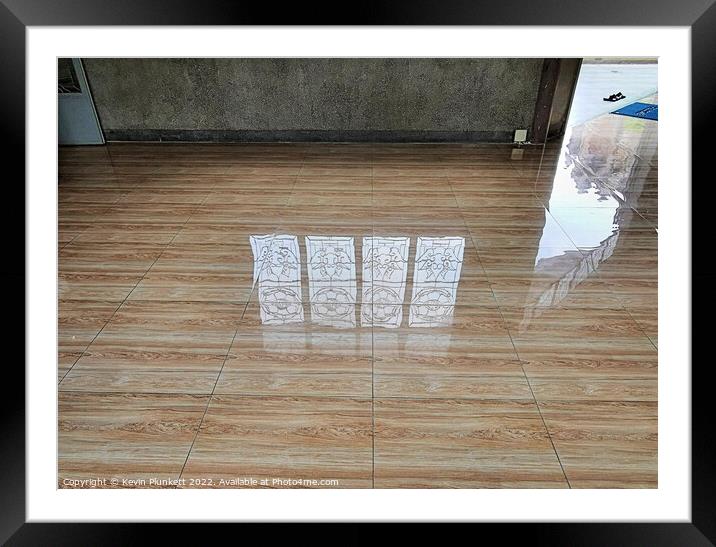Reflected images on a shiny floor  Framed Mounted Print by Kevin Plunkett