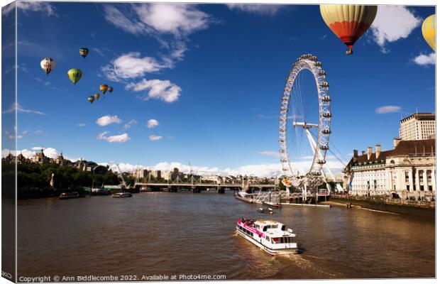 London eye as hot air balloon's fly over Canvas Print by Ann Biddlecombe