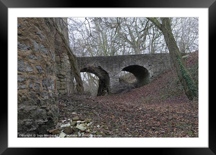 View of a stone bridge in the autumn park covered with dry leaves Framed Mounted Print by Ingo Menhard