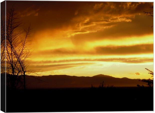 Sunset over the mountains Canvas Print by Stephanie Moore