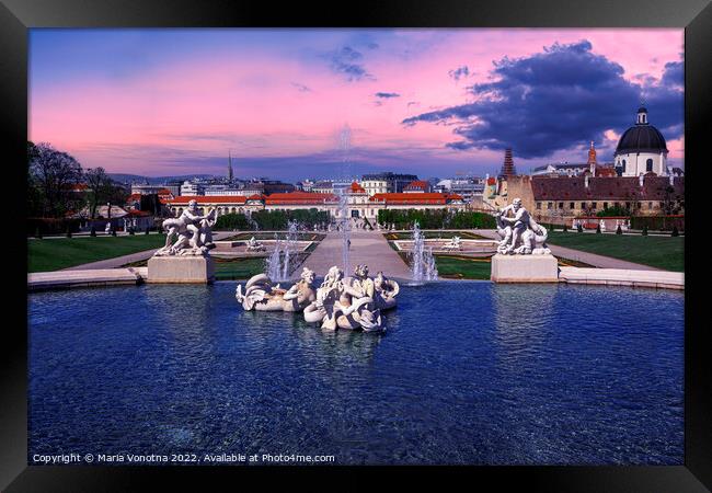 Sunset over fountain in Vienna Framed Print by Maria Vonotna