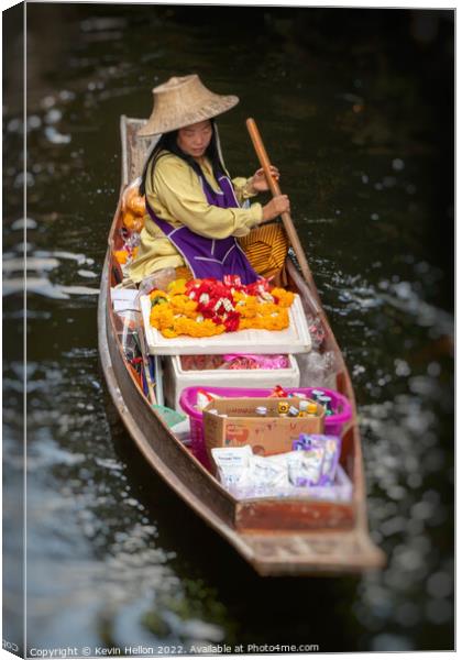 Boat vendor, Damnoen Saduak floating market, Thailand Canvas Print by Kevin Hellon