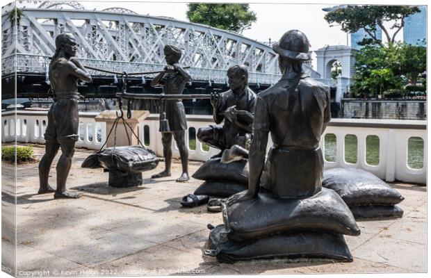 Bronze sculptures on Boat Quay Singapore Canvas Print by Kevin Hellon