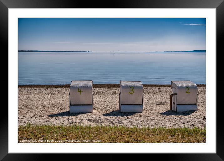 Beach chairs in Flensburg fjord between Denmark and Germany Framed Mounted Print by Frank Bach