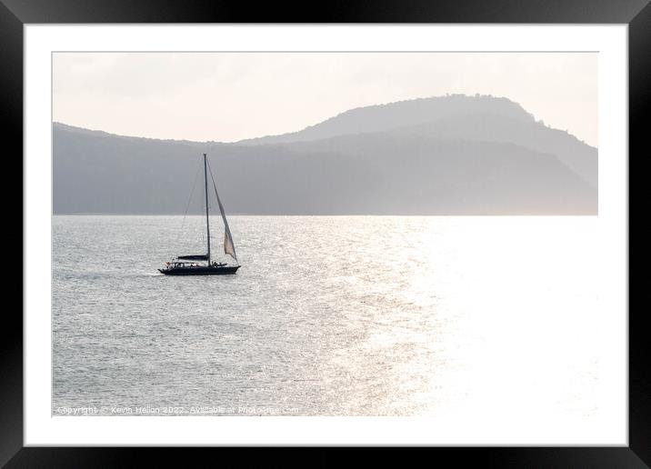 Yacht sailing towards the sun, Cape Panwa, Phuket, Thailand Framed Mounted Print by Kevin Hellon
