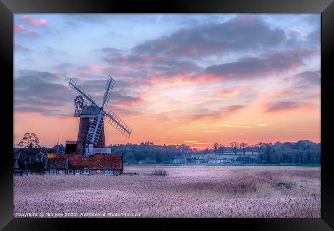 A Glowing Sunset over Cley Windmill Framed Print by Jim Key