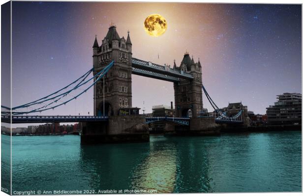 Moon lit night over Tower bridge Canvas Print by Ann Biddlecombe
