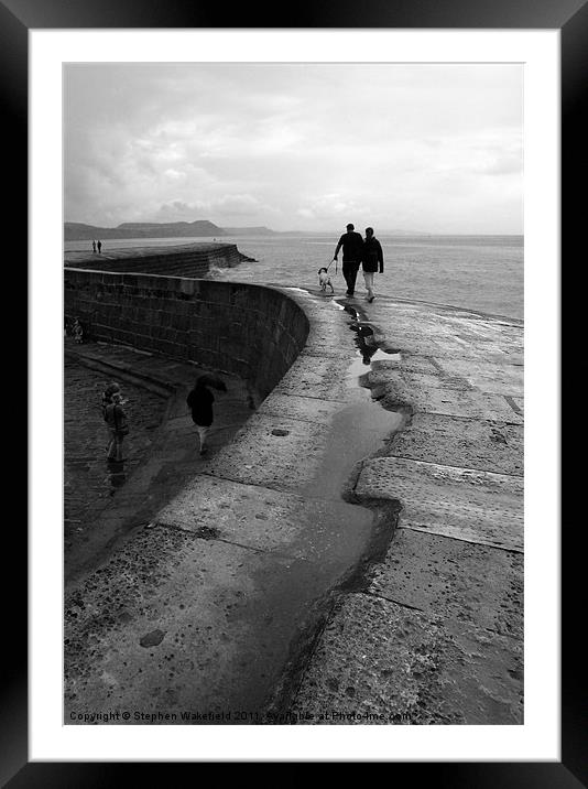 Stroll on the Cobb Framed Mounted Print by Stephen Wakefield