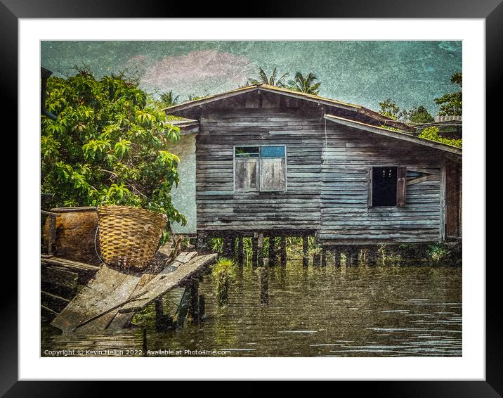 Old teak house on a canal in Thonburi, Bangkok, Thailand Framed Mounted Print by Kevin Hellon