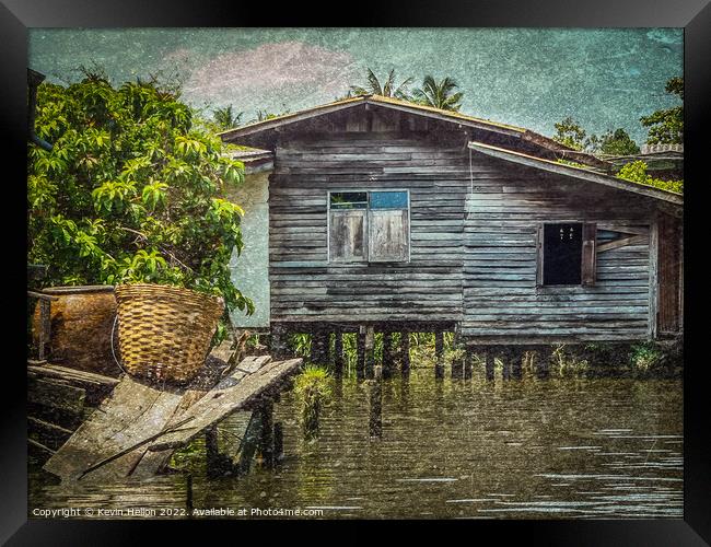 Old teak house on a canal in Thonburi, Bangkok, Thailand Framed Print by Kevin Hellon