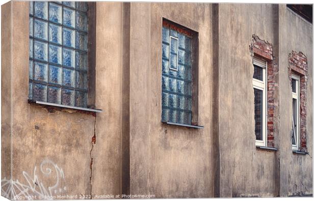 Old weathered wall facade with windows Canvas Print by Ingo Menhard