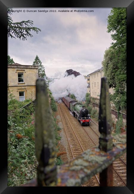 Mayflower steam train through the railings  Framed Print by Duncan Savidge