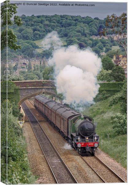 Steam train accelerating out of Oldfield Park Bath Canvas Print by Duncan Savidge