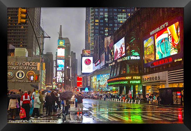 Times Square in the Rain Framed Print by Iain Mavin