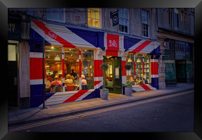 Bill's restaurant at dusk decorated in the Great Britain flag  Framed Print by Duncan Savidge
