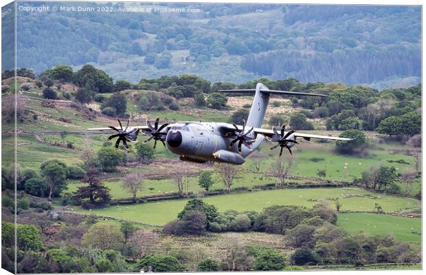 A400 Military Aircraft flying low level in Wales Canvas Print by Mark Dunn