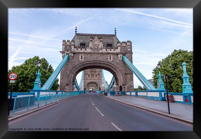 Looking through Tower Bridge Framed Print by Clive Wells