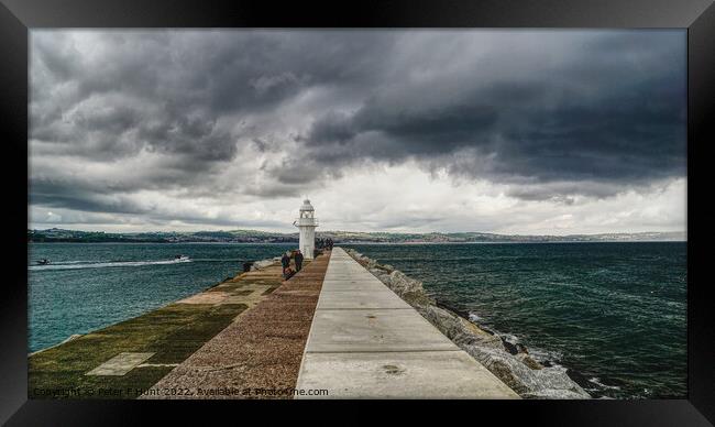 Moody Sky Over The Breakwater Framed Print by Peter F Hunt