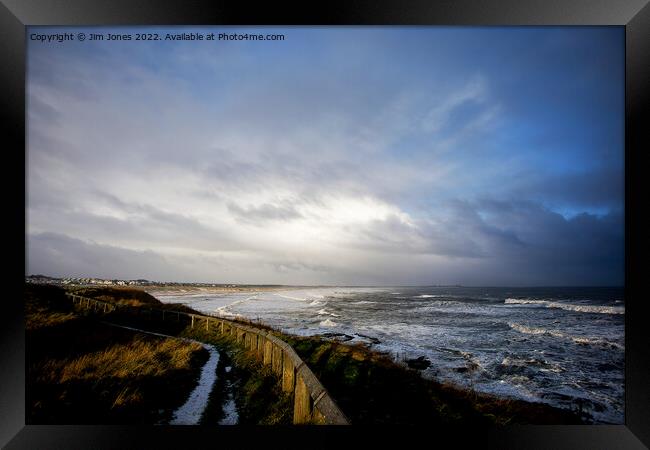 Winter weather over the North Sea Framed Print by Jim Jones