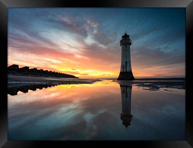 New Brighton's Perch Rock Lighthouse Sunset Reflection  Framed Print by Andrew George