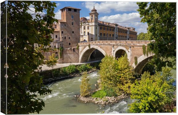 Pons Fabricius and Tiber Island in Rome Canvas Print by Artur Bogacki