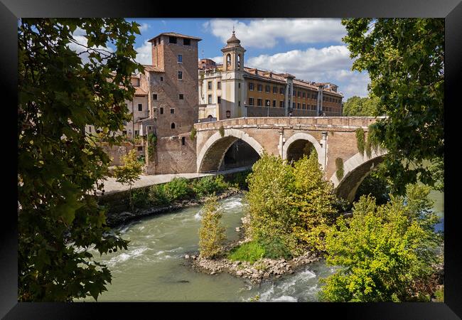 Pons Fabricius and Tiber Island in Rome Framed Print by Artur Bogacki