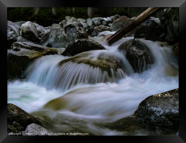 Water Rushing Over Boulders Framed Print by Maciej Czuchra