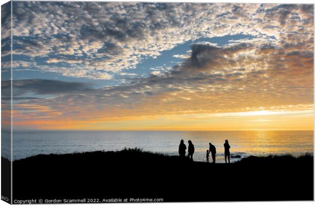 Sunset over Fistral Bay in Newquay in Cornwall. Canvas Print by Gordon Scammell