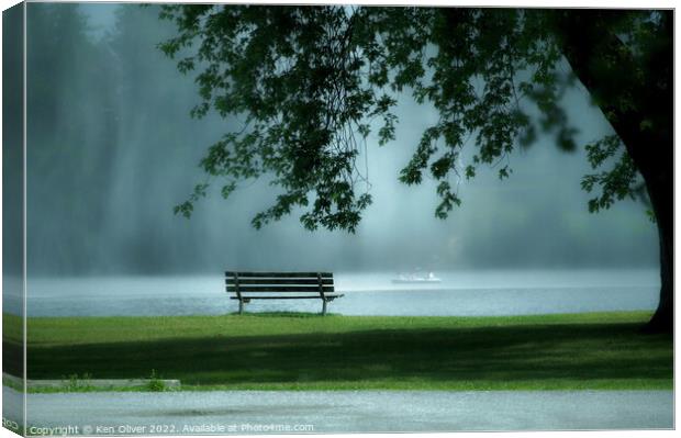 "Enchanting Serenity: A Park Bench by the Misty La Canvas Print by Ken Oliver