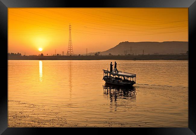 Sunset over The River Nile Framed Print by Ian Collins