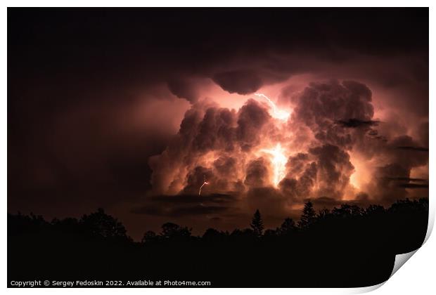 Lightning in the sky during a storm at night Print by Sergey Fedoskin