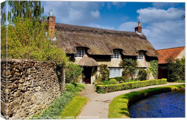 Serenity in a Thatched Cottage Canvas Print by Rodney Hutchinson