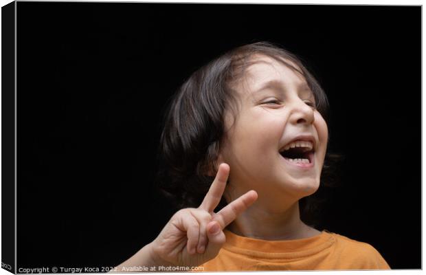 Cheerful little boy with Victory Hand Sign as Vict Canvas Print by Turgay Koca