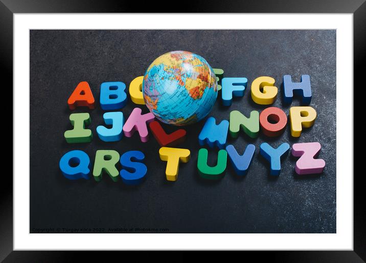 Abc wooden alphabet letters and globe for learning Framed Mounted Print by Turgay Koca